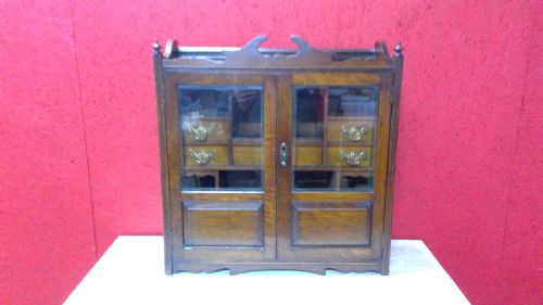 extra large Edwardian double door oak collectors cabinet with bevelled glass doors