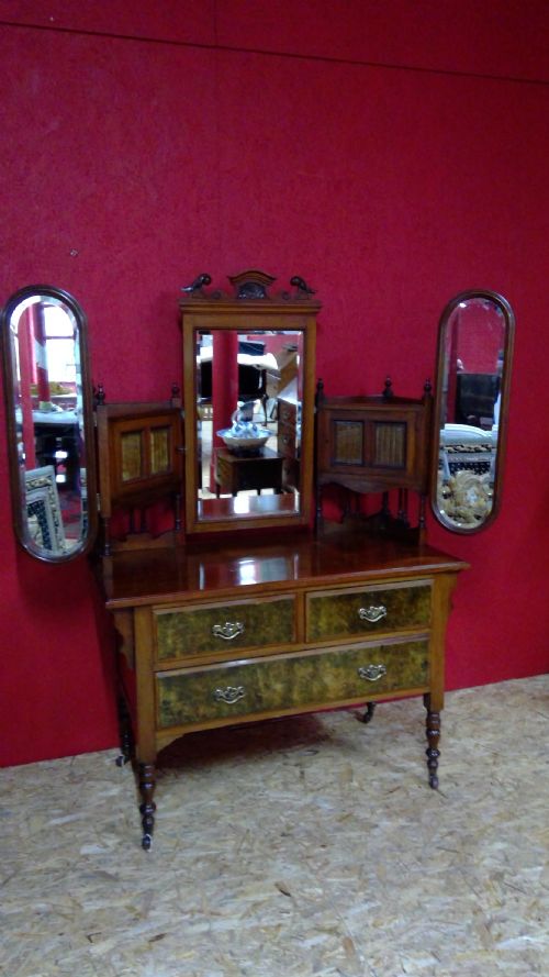 a good late Victorian triple mirrored  walnut dressing table of useful proportions and applications
