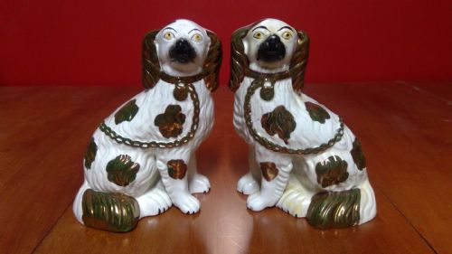 pair of copper lustre antique  staffordshire  pottery open leg  mantle dogs