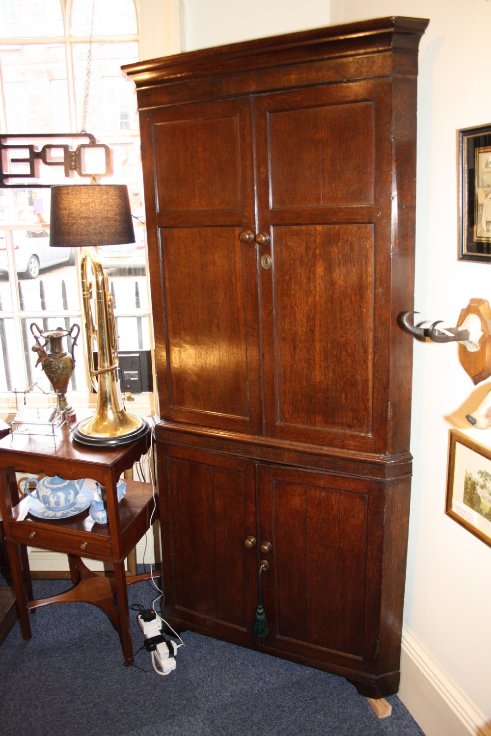 Late 18th century oak floor standing corner cupboard