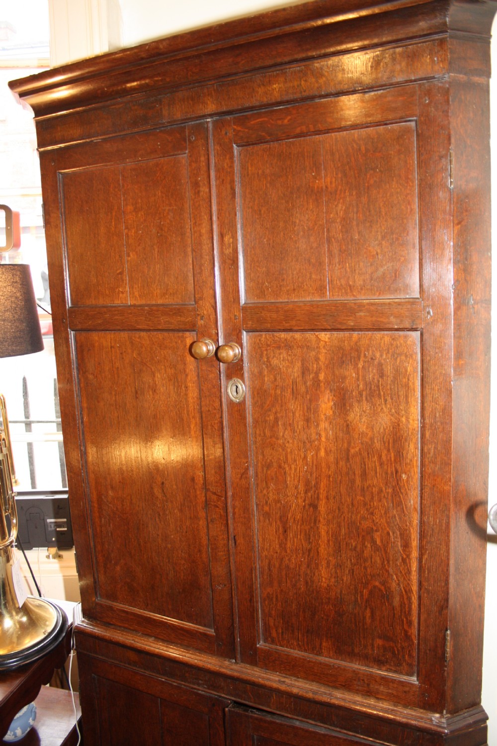 Late 18th century oak floor standing corner cupboard View II