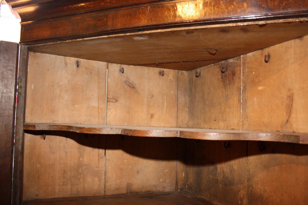 Late 18th century oak floor standing corner cupboard View VIII