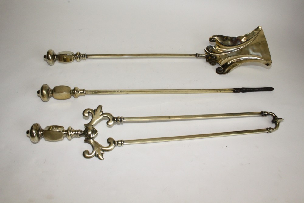Set of three Victorian brass fire tools