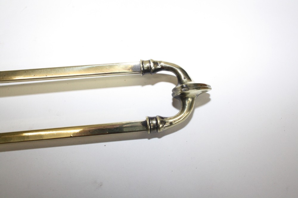Set of three Victorian brass fire tools View II
