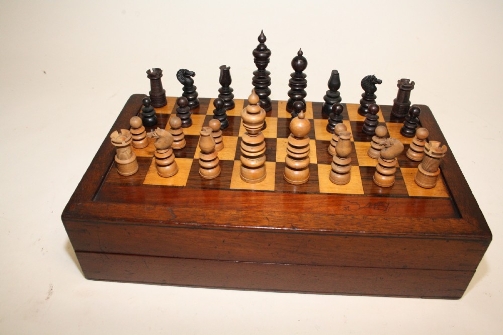 Late 19th century travel chess bored with chess set.