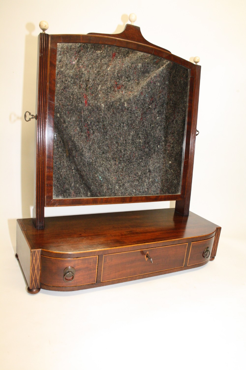 Shaped front mahogany dressing mirror C1830