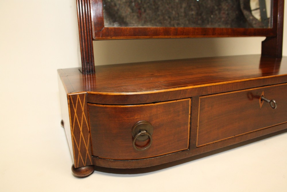 Shaped front mahogany dressing mirror C1830 View II