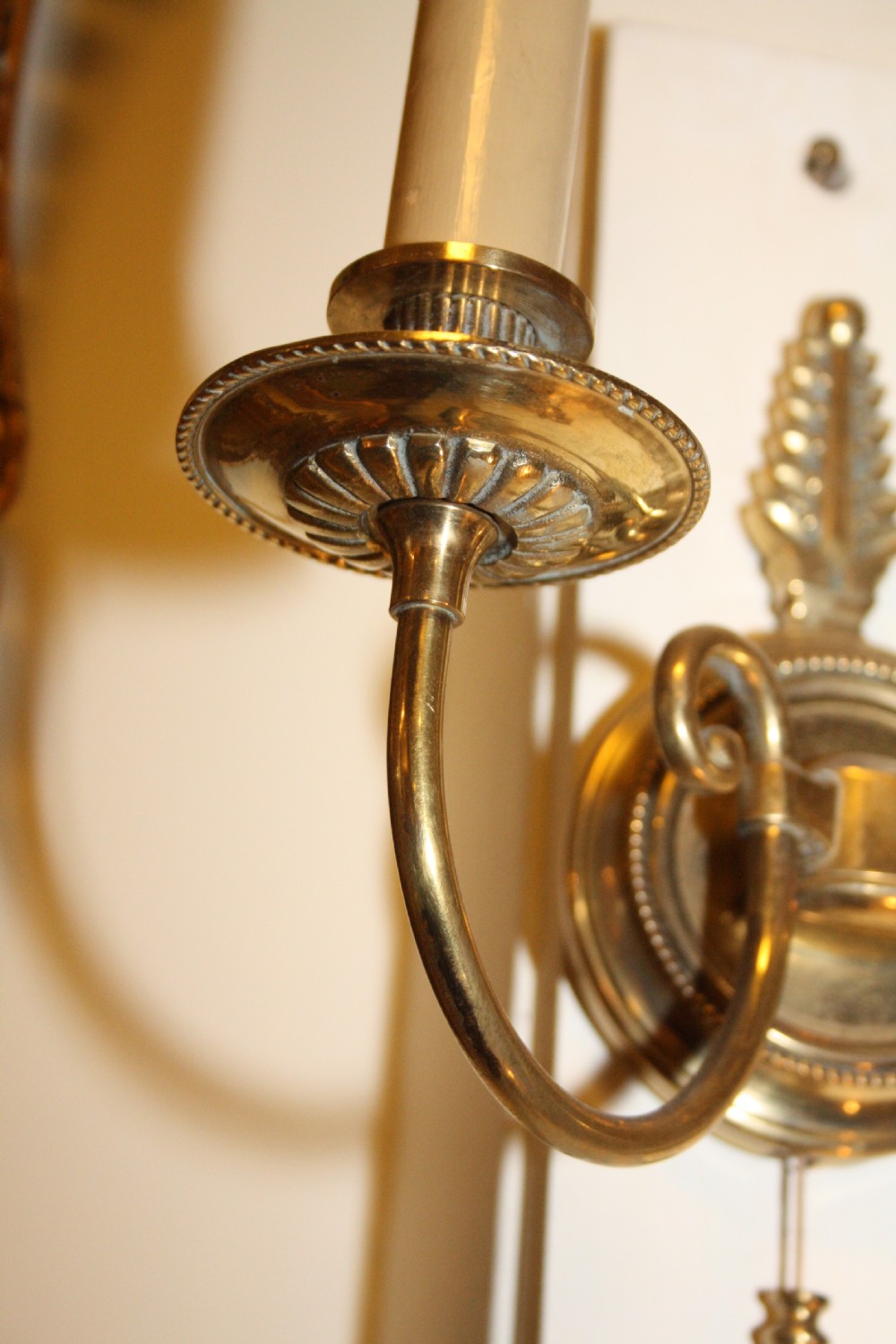 Pair of French wall lights in brass with pull switch View V