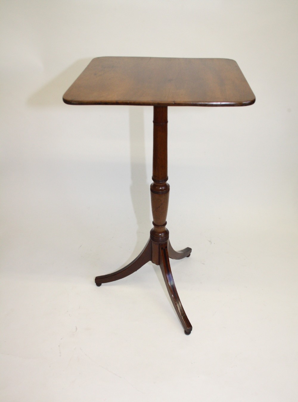 19th-century tripod table.