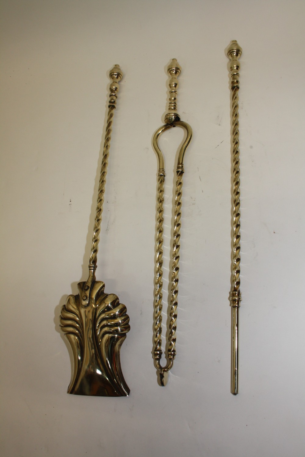 Late 19th century set of fire tools in brass