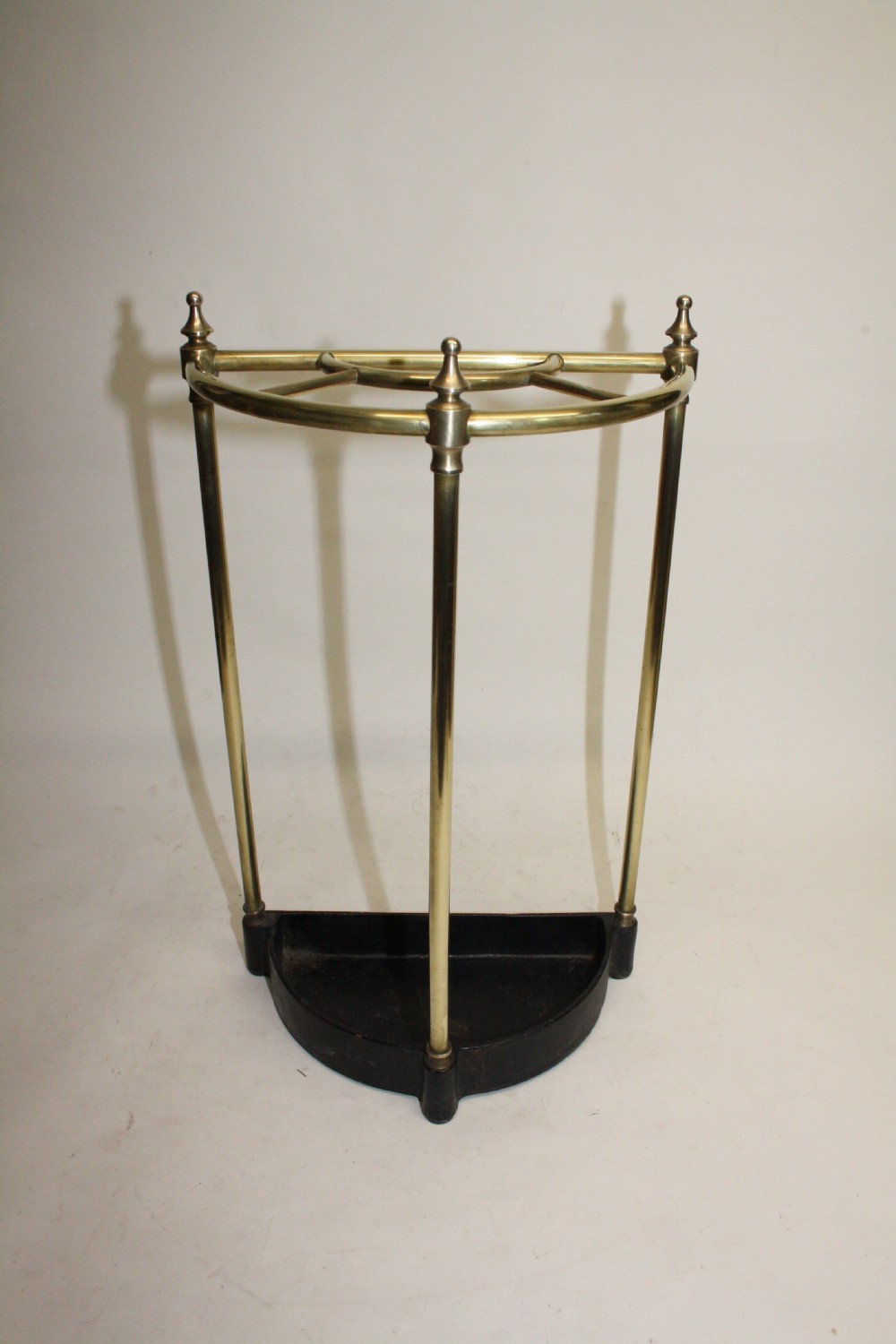 Early 20th century Demilune brass stick stand