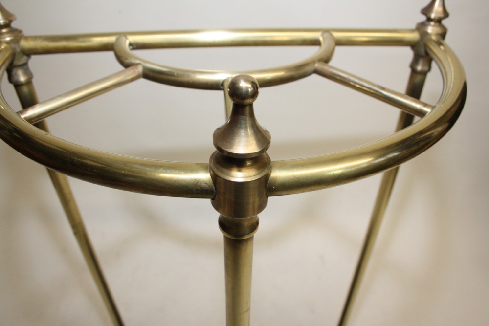 Early 20th century Demilune brass stick stand View II