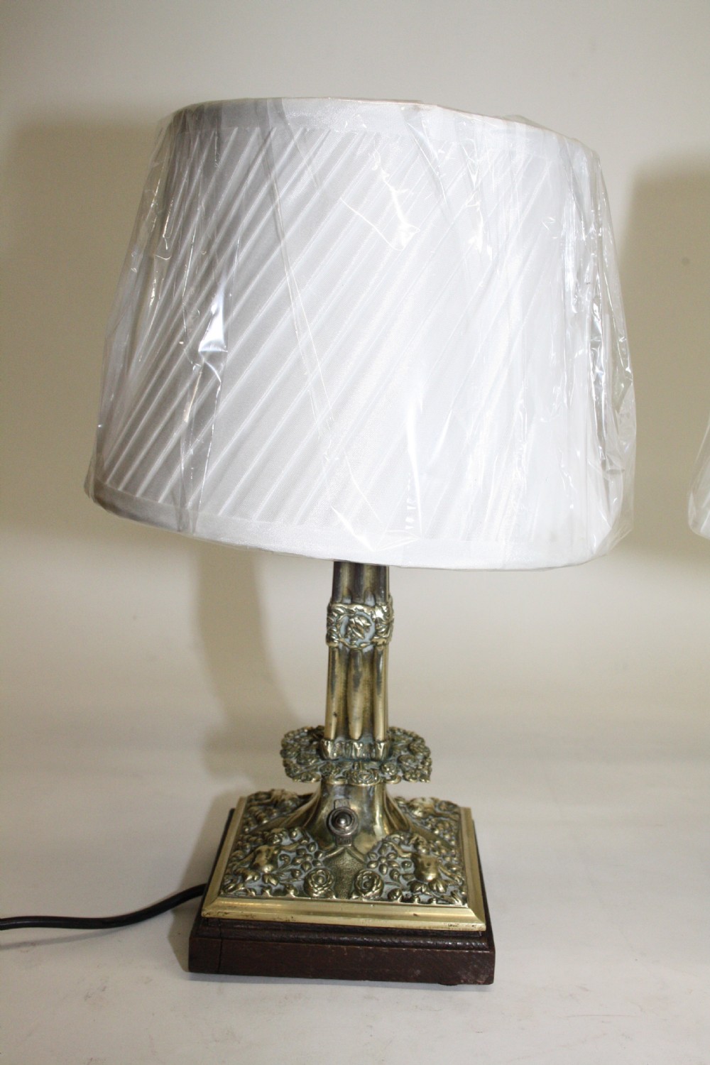Early 20th century Pair of brass lamps View II