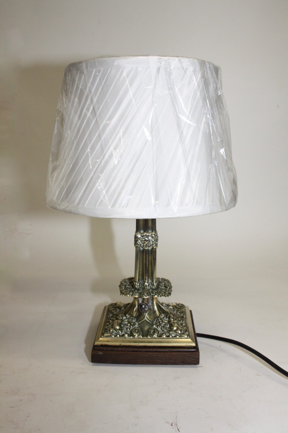 Early 20th century Pair of brass lamps View III