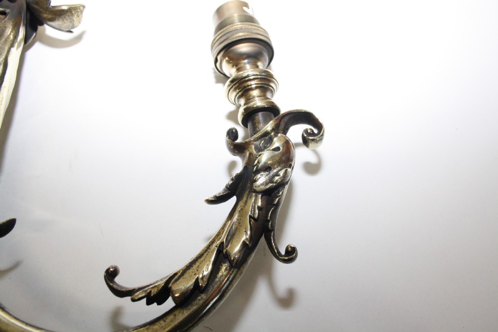 Pair of Brass wall lights with glass shades View X