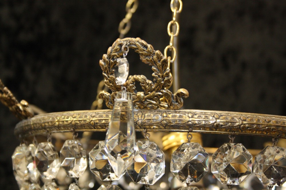 Bag chandelier with leaf decoration around the top. View VI