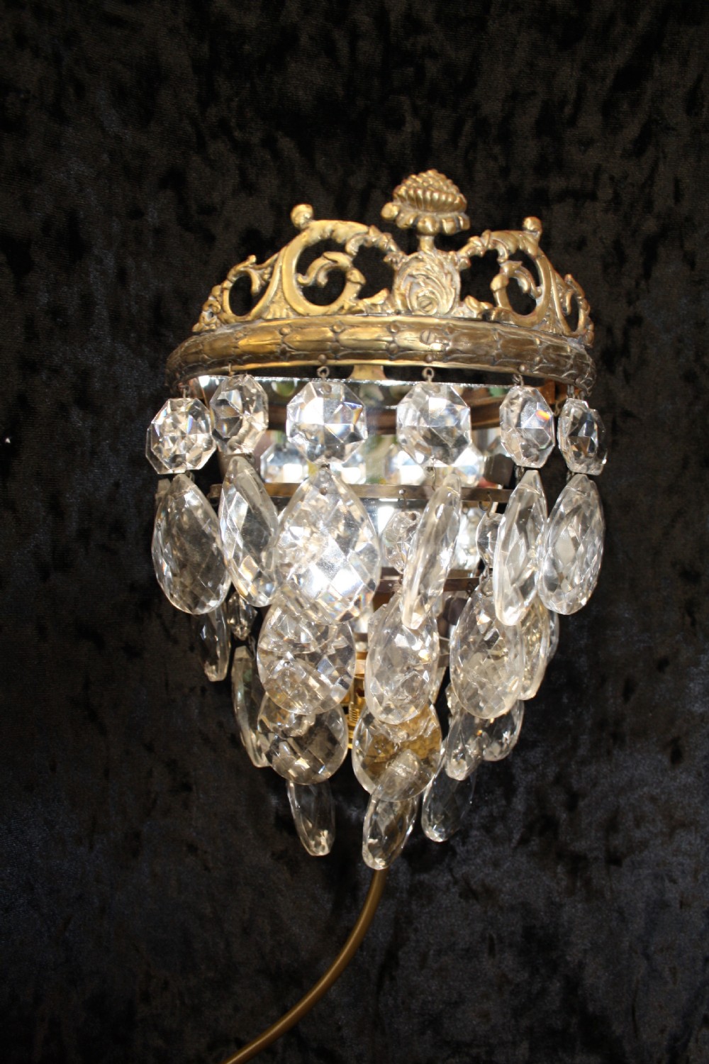 Three early 20th century cut glass wall lights