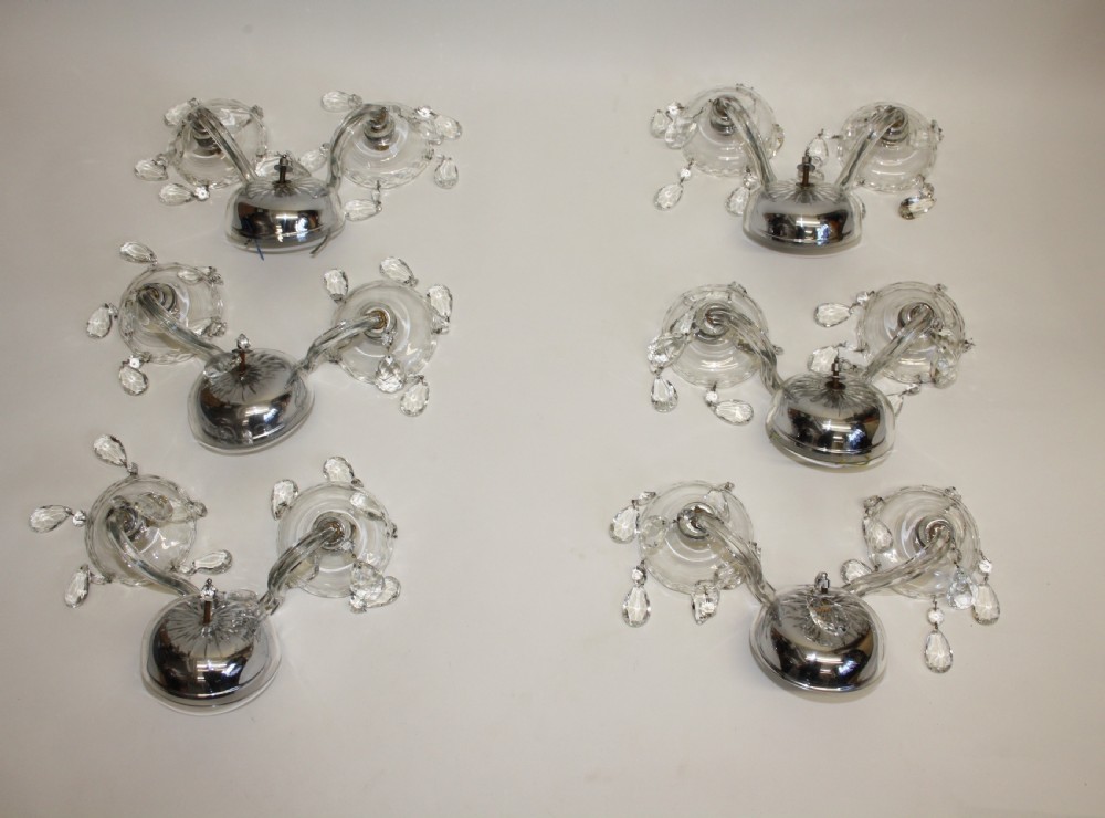Six early 20th century in cut wall lights