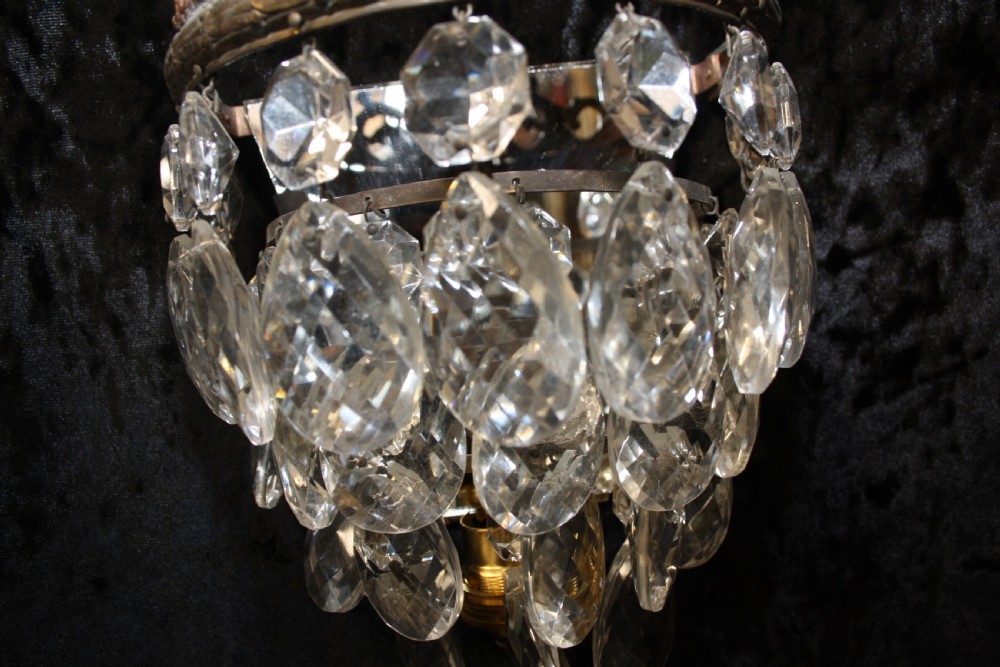 Three early 20th century cut glass wall lights View VI
