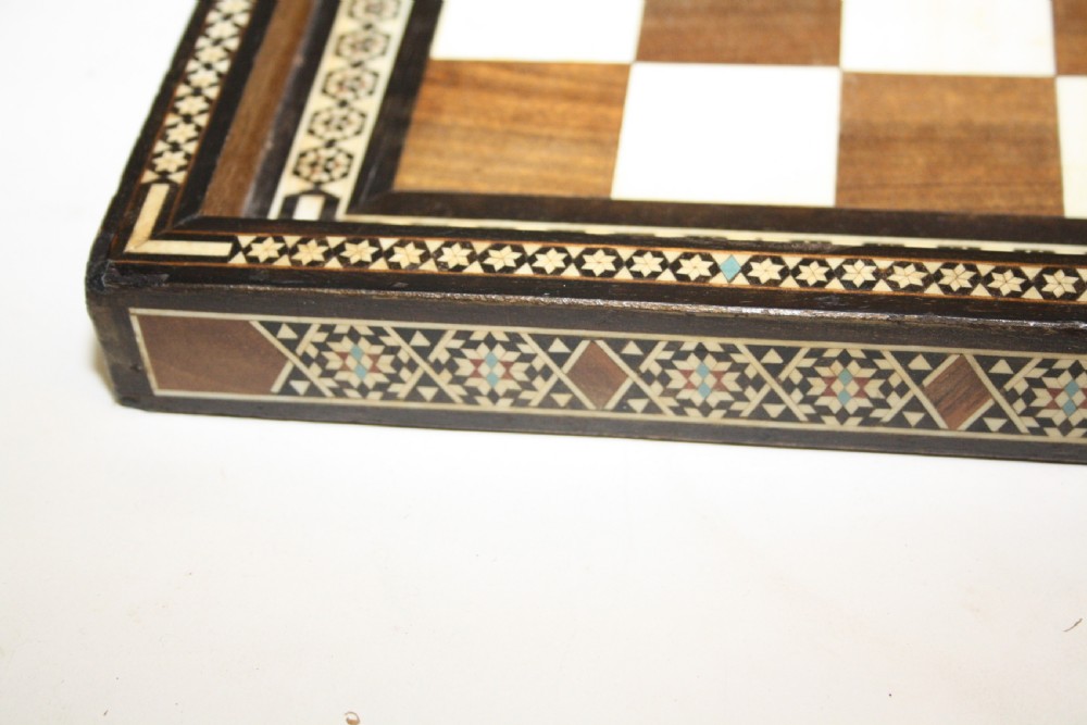 Early 20th century chess board in bone ebony and teak.  View II