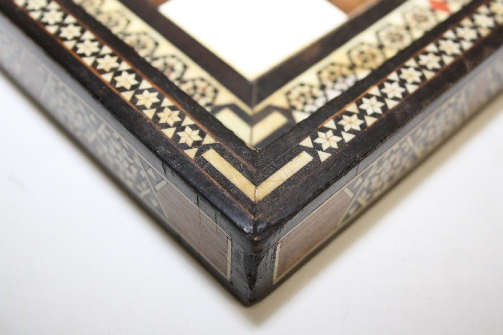 Early 20th century chess board in bone ebony and teak.  View VII