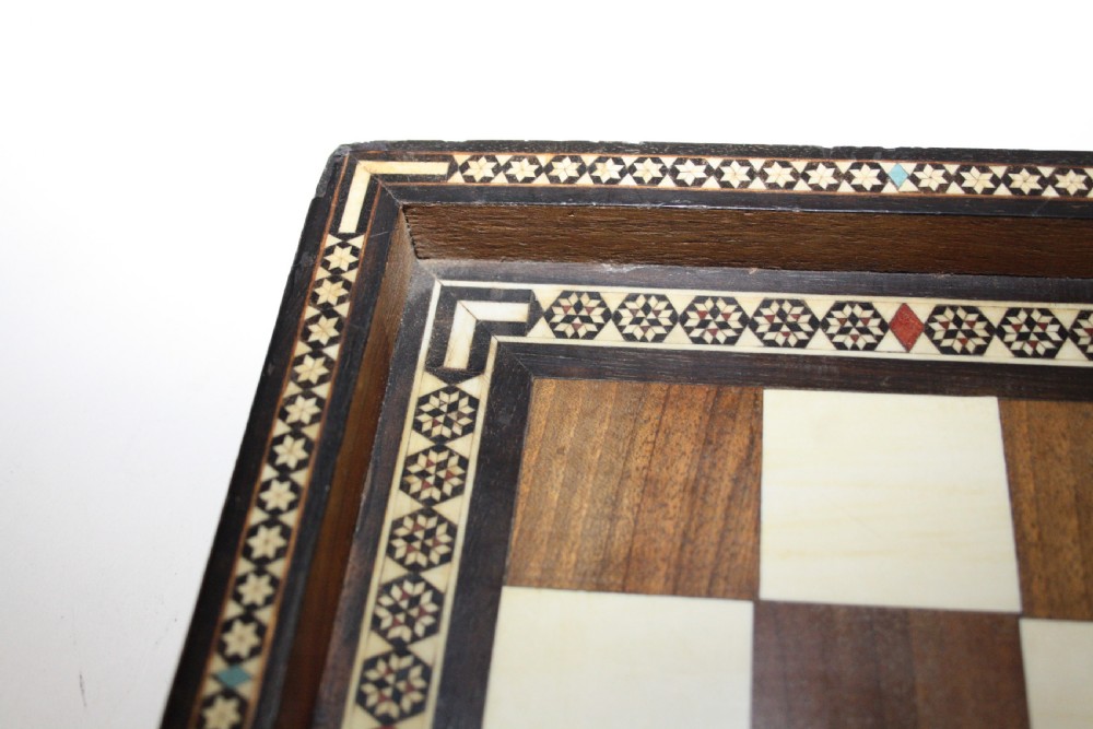 Early 20th century chess board in bone ebony and teak.  View VIII