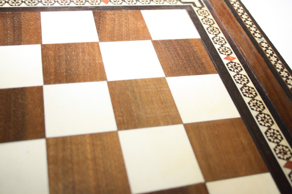 Early 20th century chess board in bone ebony and teak.  View IX