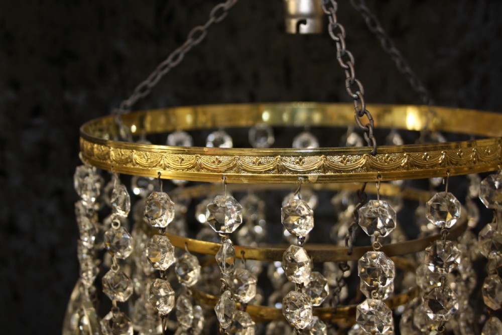 Gilt brass chandelier with unusually large drips to the top. View III