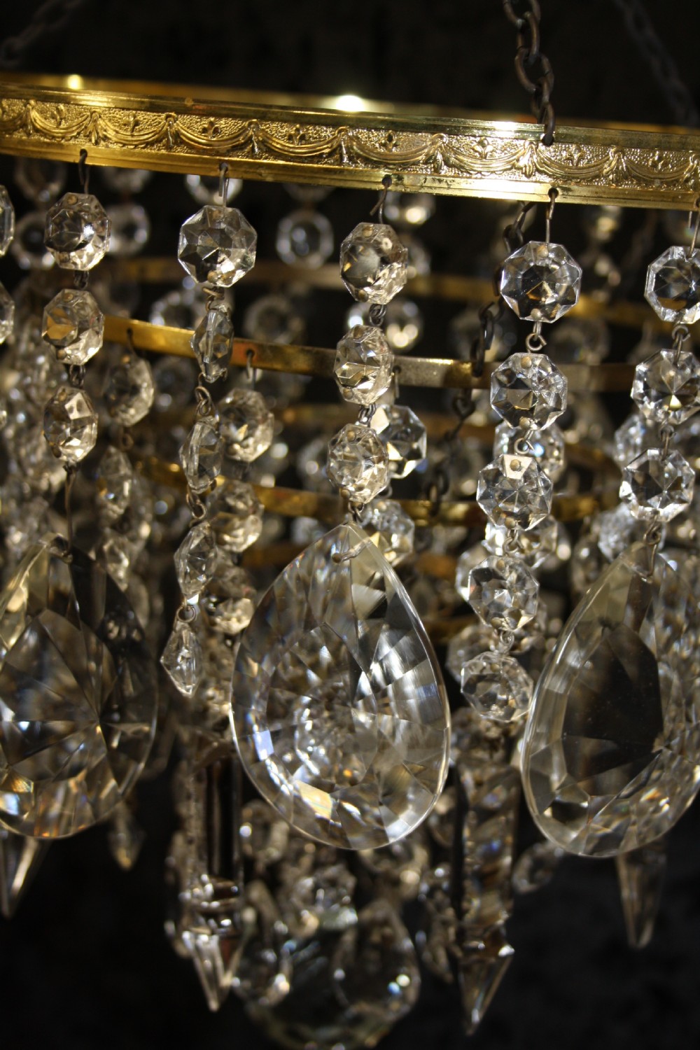 Gilt brass chandelier with unusually large drips to the top. View IV