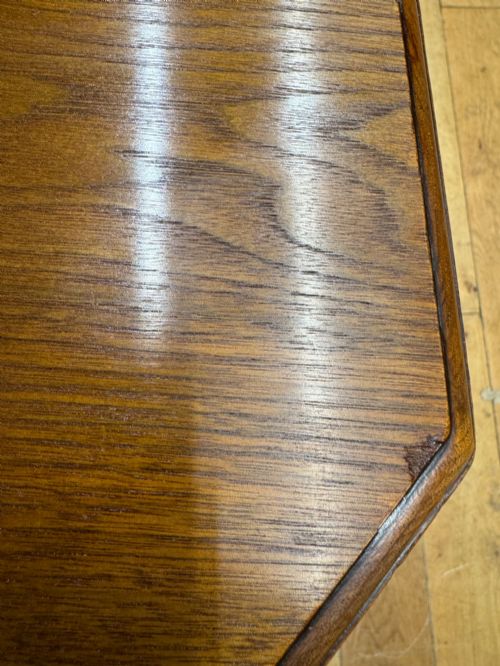 fig 3. A solid walnut Victorian extending dining table with reeded turned legs set on brass castors.