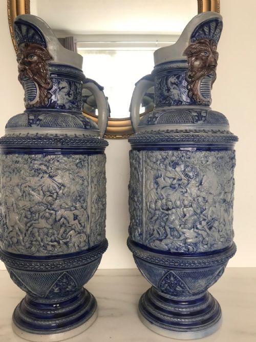 GERMAN WESTERWALD SALT GLAZED STONEWARE PITCHER JUGS COBALT BLUE WITH ROMAN BATTLE SCENES BY MAKER SIMON PETER GERZ