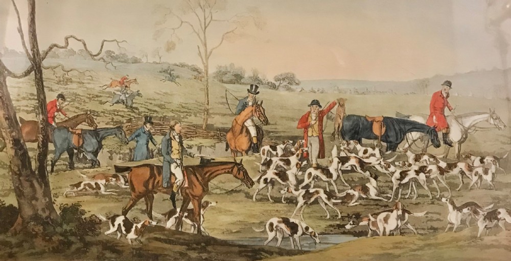 A Georgian era hand-coloured sporting print illustrating mounted huntsmen and foxhounds gathering in an open countryside landscape.