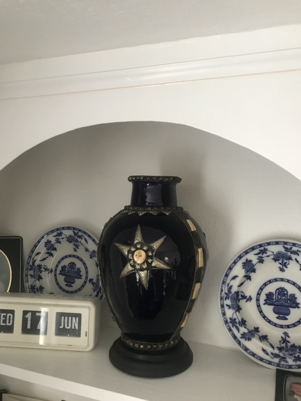 A cobalt blue glazed terracotta vase featuring silver-tone metal mounts, bone inlay strips, a star motif, and a black base. View XII