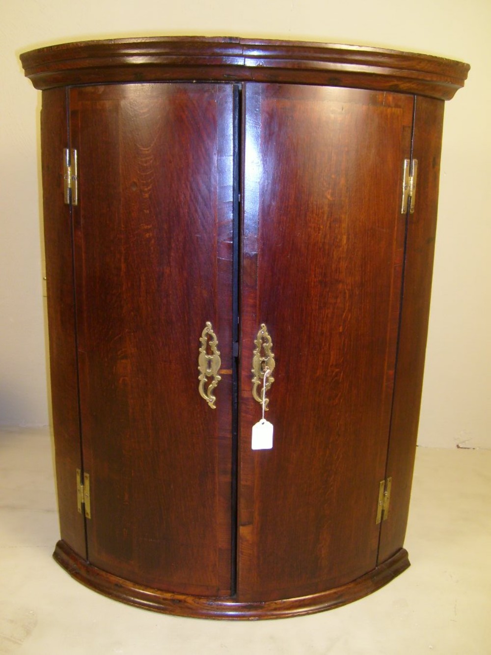 OAK BOW FRONTED CORNER CUPBOARD