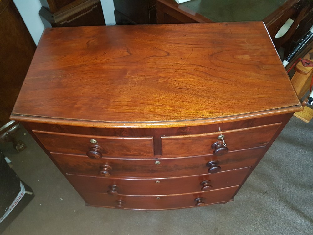 ANTIQUE BOW FRONTED CHEST OF DRAWERS  View II