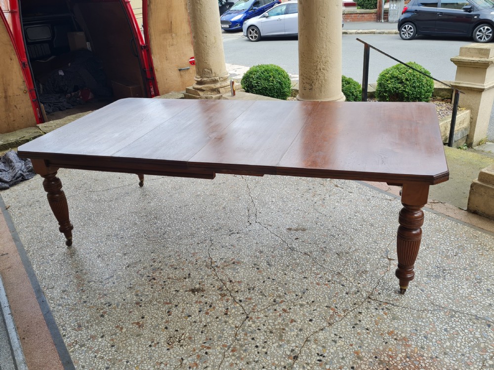 ANTIQUE WALNUT  EXTENDING TABLE  View VI