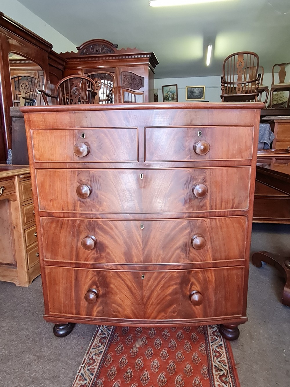 ANTIQUE BOW FRONTED CHEST OF DRAWERS 