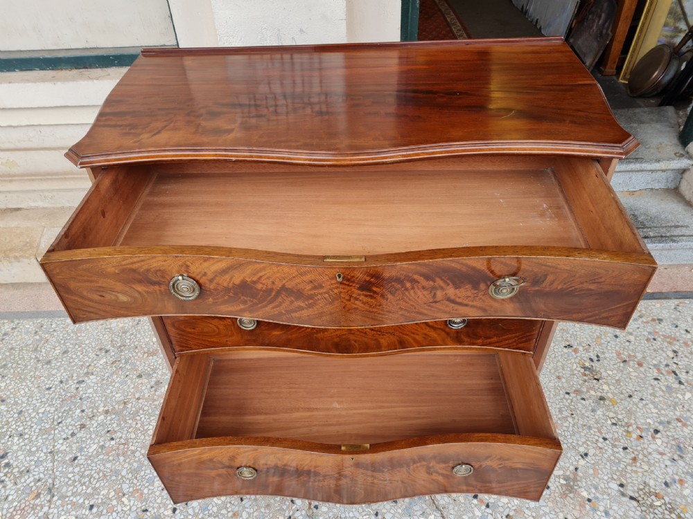 ANTIQUE MAHOGANY SEPENTINE CHEST OF DRAWERS View IV
