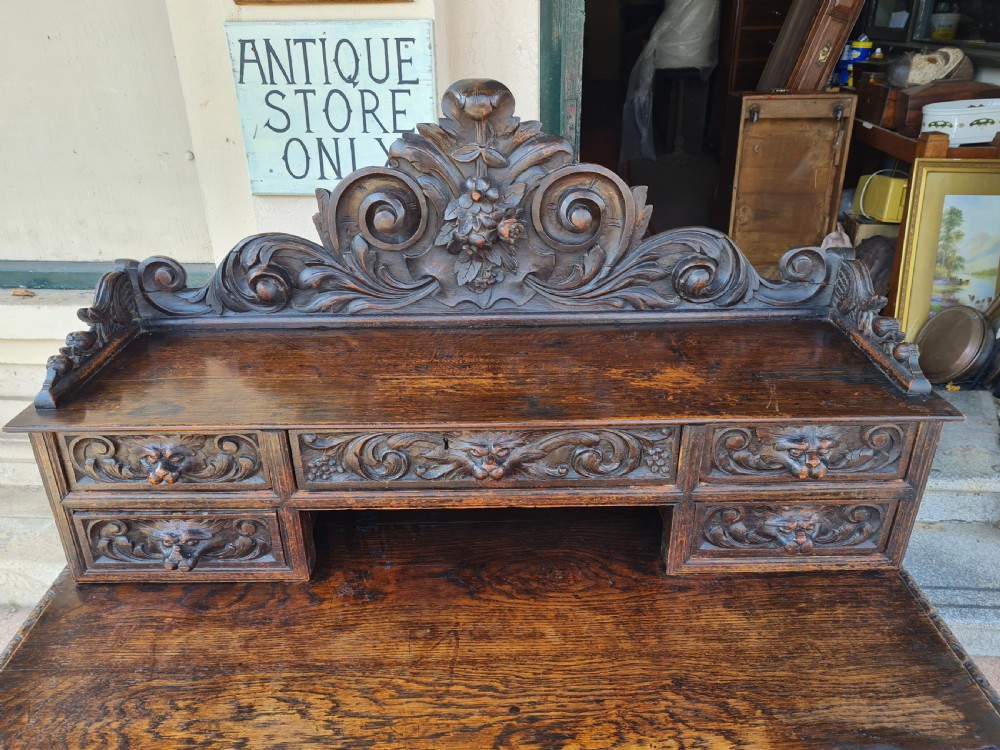 ANTIQUE CARVED OAK DESK  View V