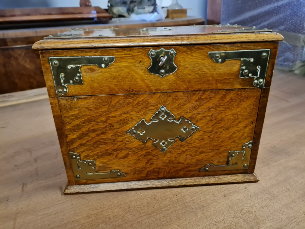 ANTIQUE OAK TOBACCO CABINET  View II
