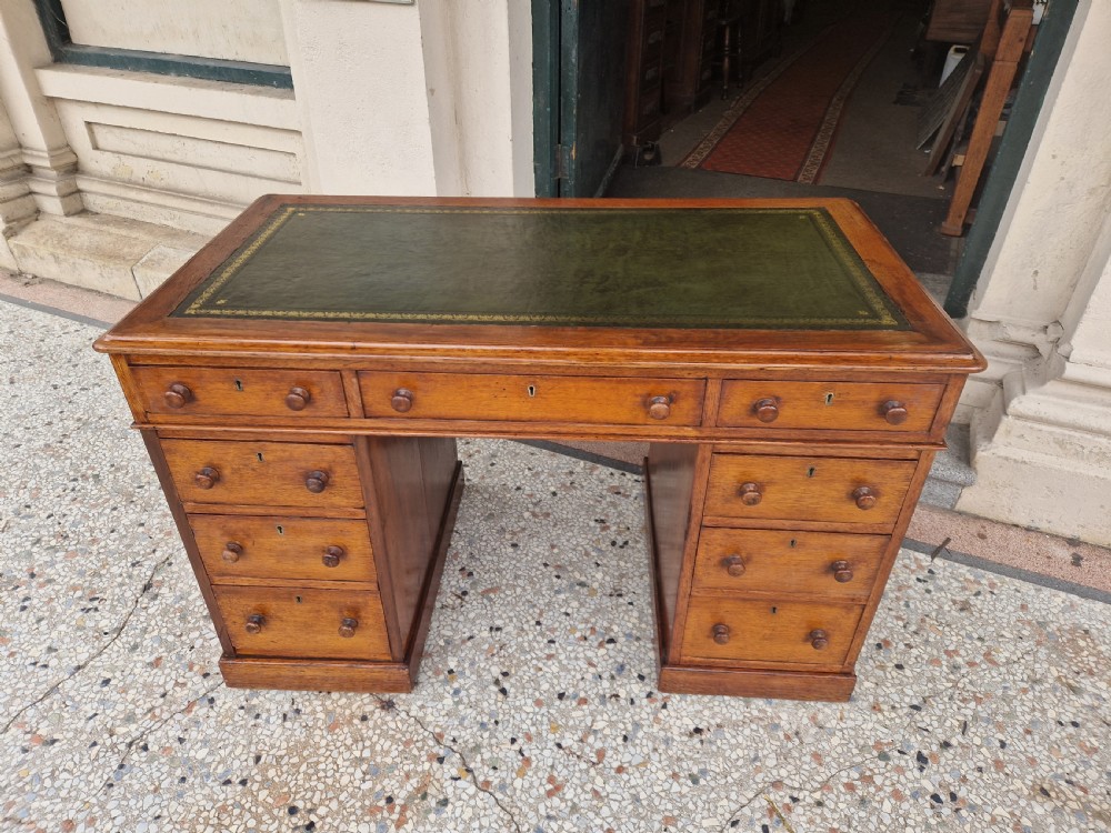 ANTIQUE OAK MAPLE AND CO PEDESTAL DESK . View VIII