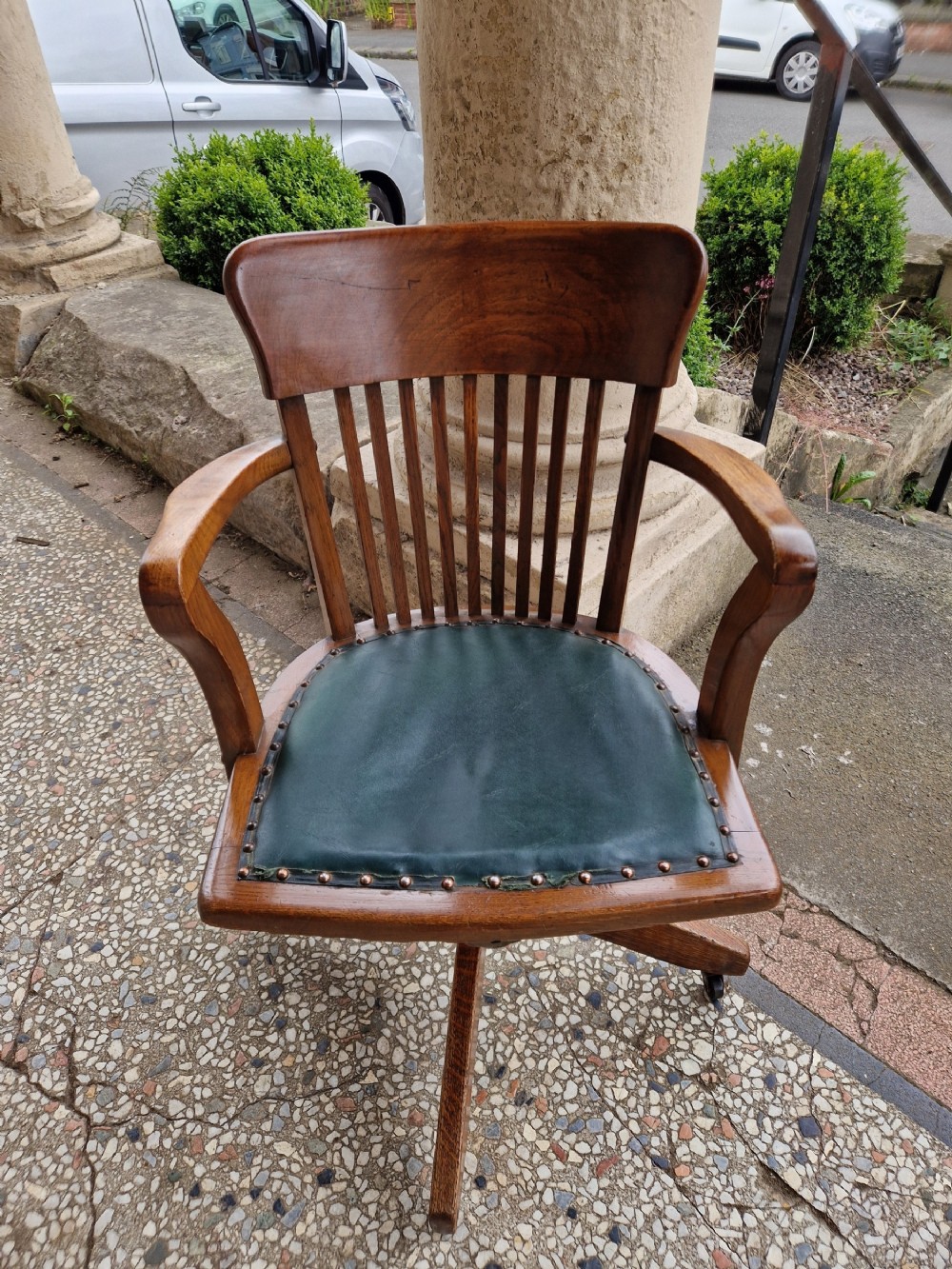 ANTIQUE OAK SWIVEL DESK CHAIR .
