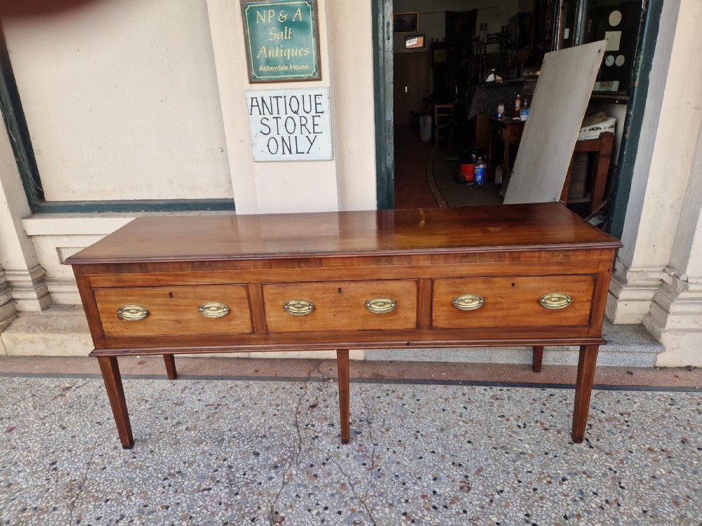 A GEORGIAN MAHOGANY DRESSER BASE . View III