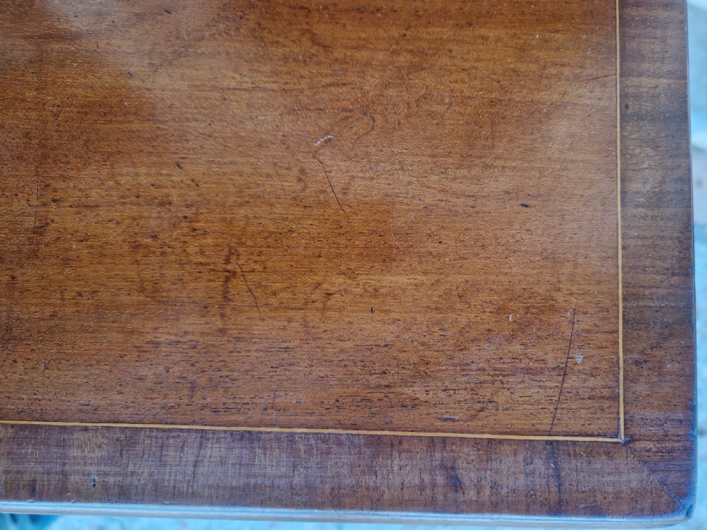 A GEORGIAN MAHOGANY DRESSER BASE . View V