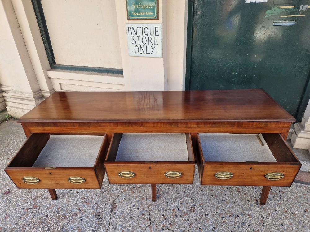 A GEORGIAN MAHOGANY DRESSER BASE . View VI
