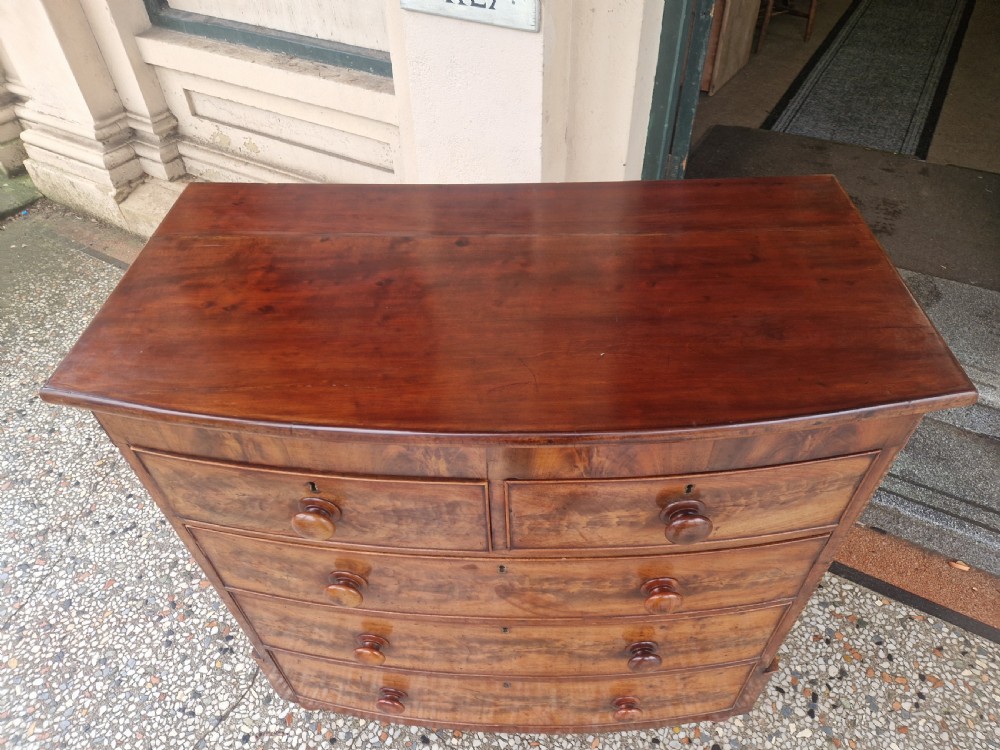 VICTORIAN MAHOGANY BOW FRONTED CHESTOF DRAWERS  View IX