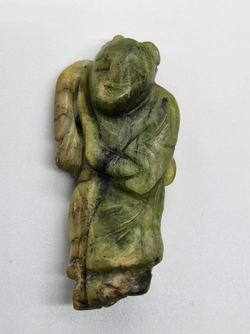 A Chinese Carved Green Jade Figure Ming Dynasty