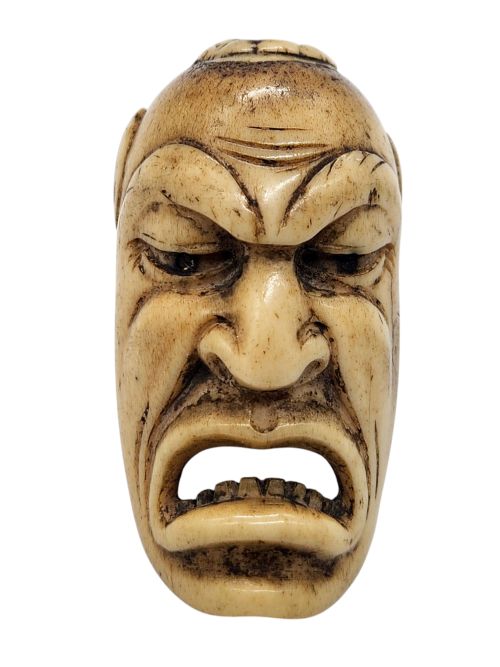 fig 1. A JAPANESE EDO PERIOD FINE CARVED ANTLER MASK NETSUKE OF HANNYA