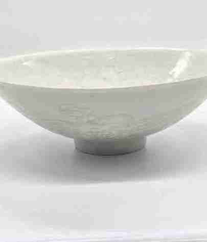 A LARGE CHINESE QINGBAI-GLAZED CONICAL BOWL ... 6