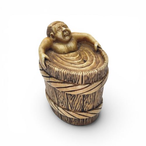 A Rare Japanese Stag Antler Netsuke of a Bather Late Edo Period (Mid-19th Century)